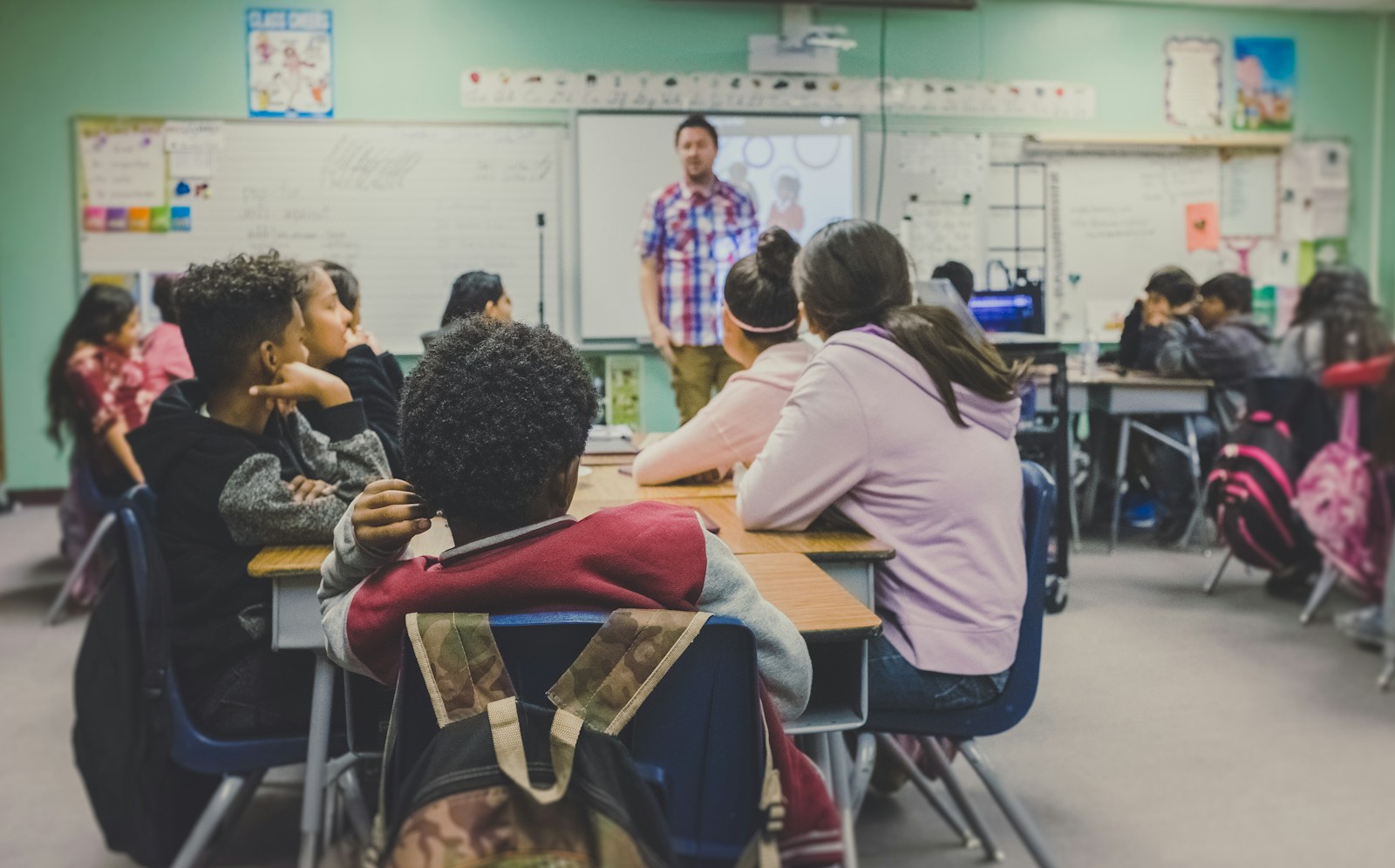 Students listening and learning together in a classroom